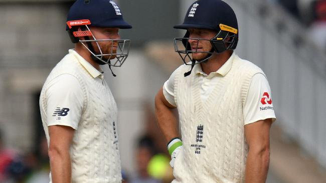 England's killer Bs: Jonny Bairstow and Jos Buttler during a break in play. Picture: AFP