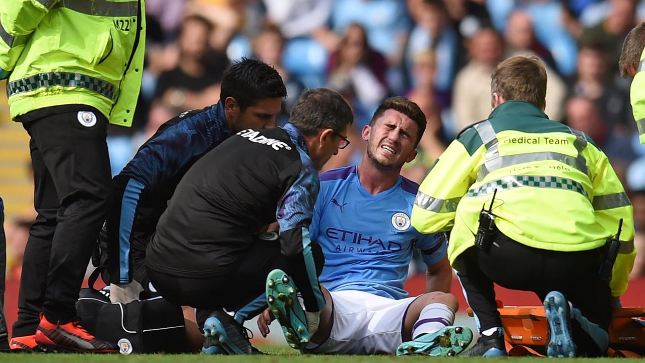 Manchester City's Aymeric Laporte was in excruciating pain after suffering a knee injury a fortnight ago. (Photo by Oli SCARFF / AFP)