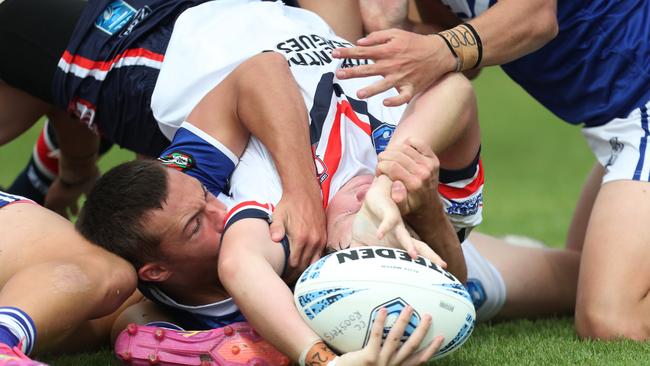 Billy McDonald reached out to give the Roosters a halftime lead. Picture: Sue Graham