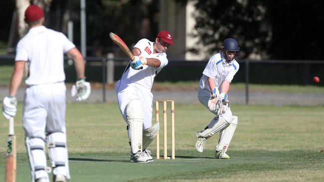 Mount Evelyn’s Kane Jones goes on the attack against Seville. Picture: Stuart Milligan