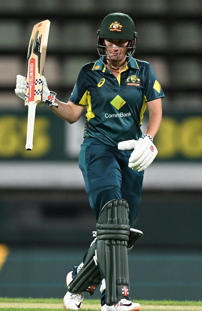 Beth Mooney celebrates a second half century of the three game T20 series. Picture: Steve Bell/Getty Images