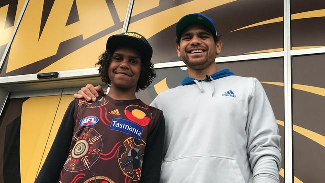 Cebby Johnson with footy star Cyril Rioli.