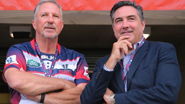 Former Melbourne Rebels owner Andrew Cox (right) with England cricket legend Ian Botham last year. Picture: Getty Images