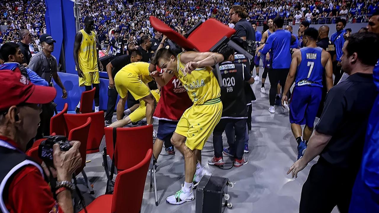 Nathan Sobey wore a chair during the confrontation. Picture: AFP