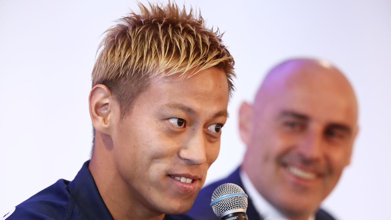 Keisuke Honda and Kevin Muscat attend a Melbourne Victory press conference at AAMI Park.