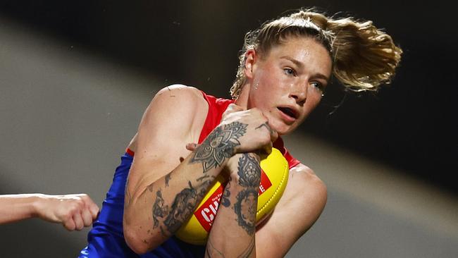 MELBOURNE, AUSTRALIA - SEPTEMBER 23: Tayla Harris of the Demons marks the ball during the round five AFLW match between the Carlton Blues and the Melbourne Demons at Ikon Park on September 23, 2022 in Melbourne, Australia. (Photo by Daniel Pockett/AFL Photos/via Getty Images)