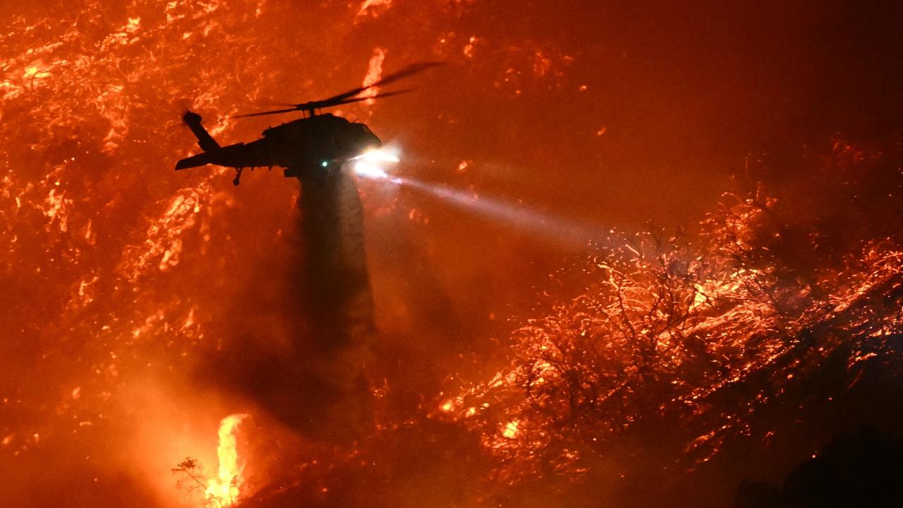 Death toll rises to 16 as LA’s largest fire threatens new areas