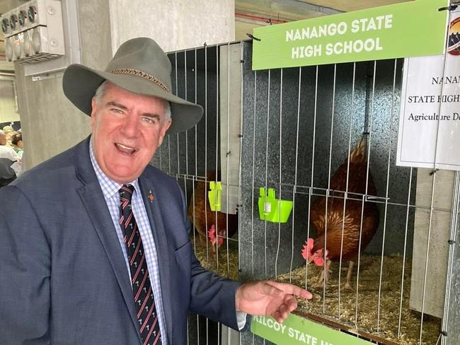 Agriculture Minister Mark Furner feeds the chooks at Ekka. Credit: Supplied