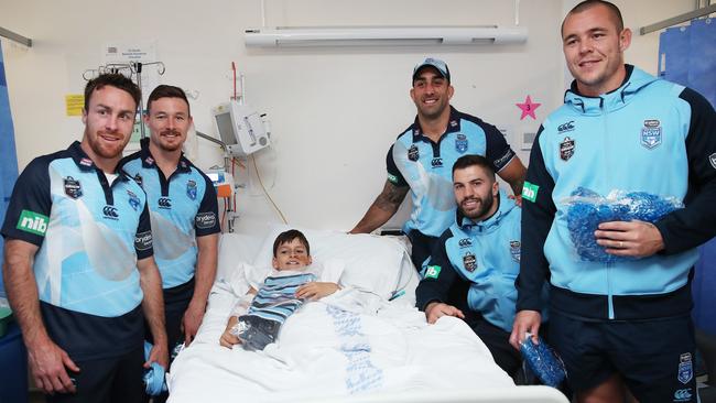 The Blues bring a smile to Luca Olender 10, at the Sydney Children's Hospital. (Phil Hillyard)