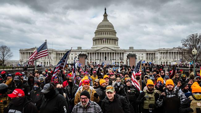 Pro-Trump protesters gather in front of the U.S. Capitol Building on January 6 before a mob stormed the Capitol, breaking windows and clashing with police officers. Picture: Jon Cherry/Getty Images/AFP.