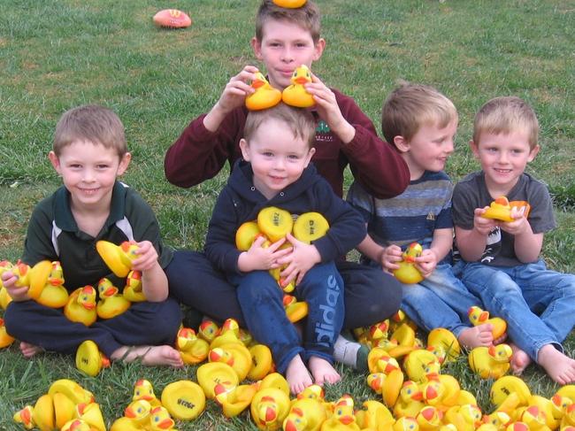 Ryder, Bryson and Tobias Nurk with Conor and Luke McLoughlin ready for what may be the last rubber duck race.