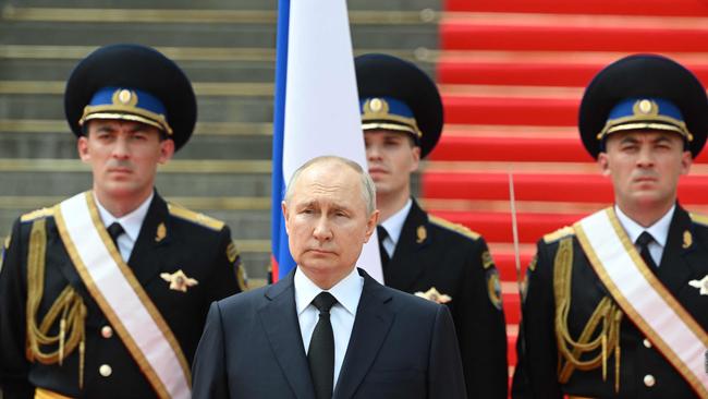 Russian President Vladimir Putin holds a minute of silence for pilots killed in clashes with Wagner mercenaries last weekend. Picture: AFP