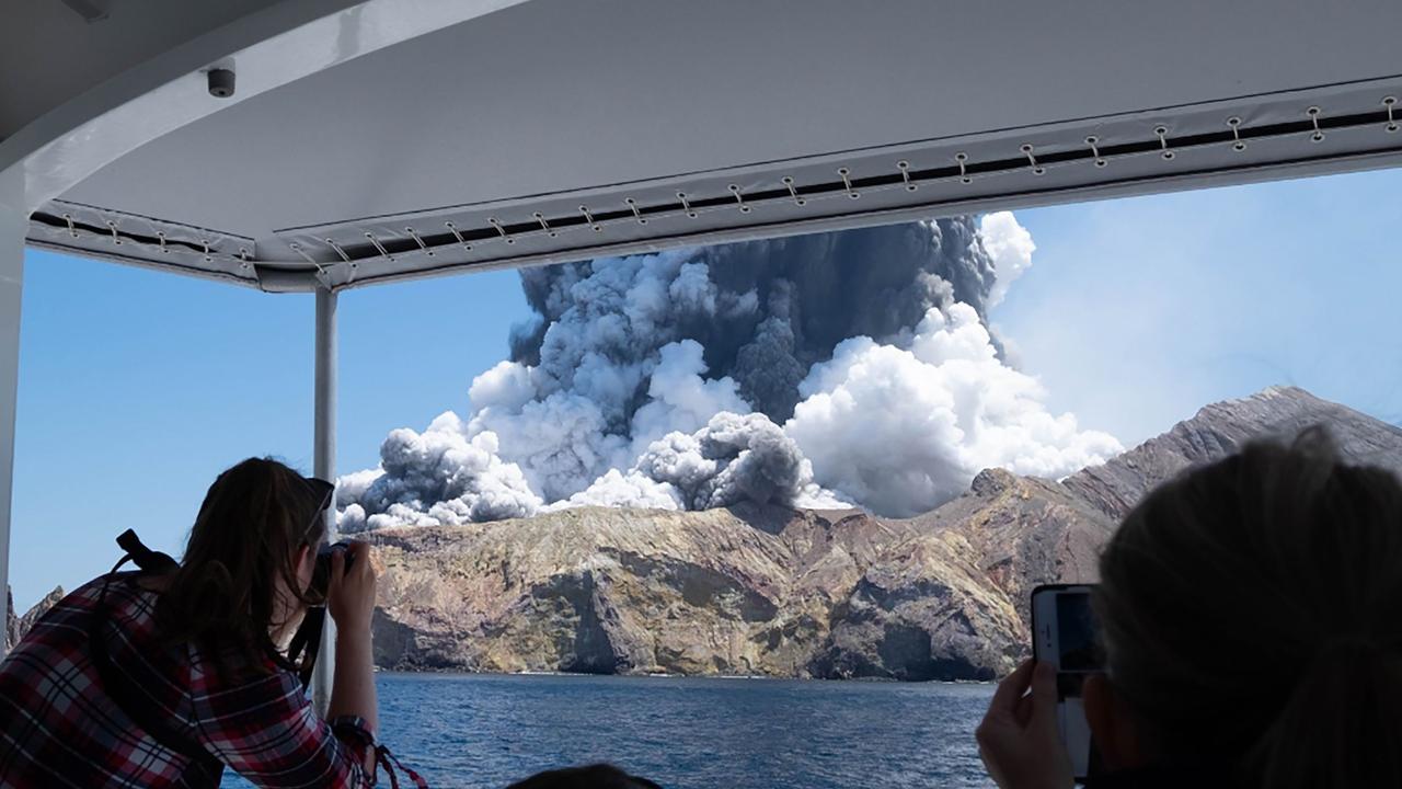 This photo courtesy of Michael Schade shows the volcano on New Zealand's White Island spewing steam and ash moments after it erupted on December 9, 2019. Picture: AFP / Michael Schade