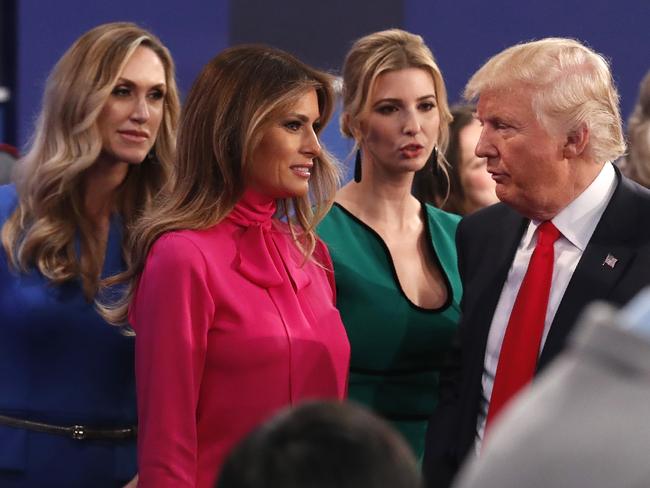 Melania Trump (pictured with Donald Trump, his daughter Ivanka, and daughter-in-law Lara Yunaska) insists lewd comments her husband made were ‘not the man she knows’. Picture: Rick Wilking