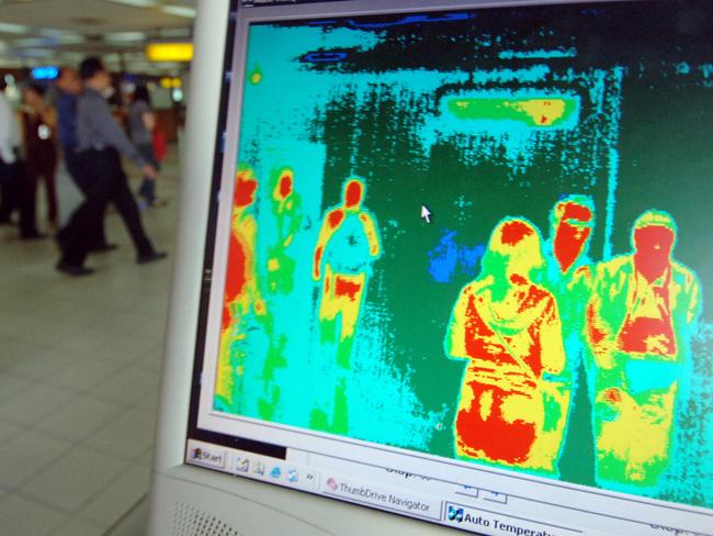 Images from a thermal imaging scanner are pictured on a computer screen as airplane passengers are screened for high temperatures upon arrival at Indonesian resort island of Bali's international airport near Denpasar, 27/04/2009 as governments across the region, which has in recent years been at the forefront of the SARS and bird flu epidemics, have stepped up checks at airports and urged the public to be on guard for symptoms of the new multi-strain swine flu strain from pigs that has killed over 100 victims in Mexico and spread to New Zealand.