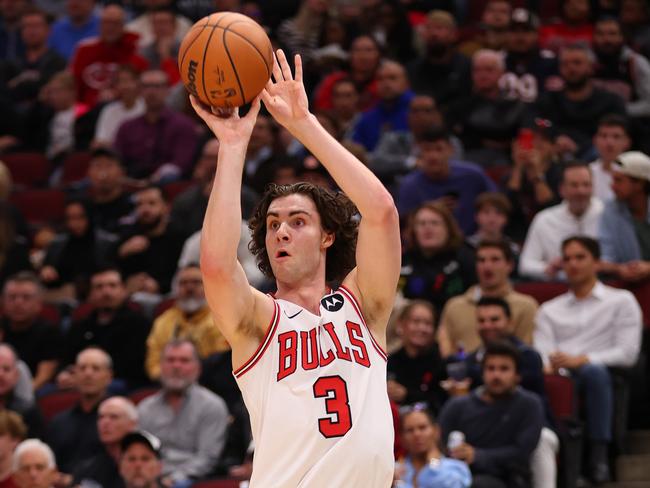 CHICAGO, ILLINOIS - NOVEMBER 04: Josh Giddey #3 of the Chicago Bulls shoots a three pointer against the Utah Jazz during the first half at the United Center on November 04, 2024 in Chicago, Illinois. NOTE TO USER: User expressly acknowledges and agrees that, by downloading and or using this photograph, User is consenting to the terms and conditions of the Getty Images License Agreement.  (Photo by Michael Reaves/Getty Images)