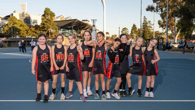 Newtown Price under-11 netball team pull their funniest faces.