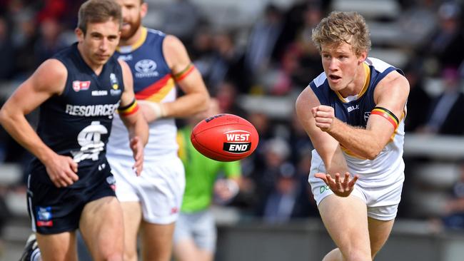 Harrison Wigg fires out a handpass while playing for Adelaide in the SANFL last season. Picture: Tom Huntley