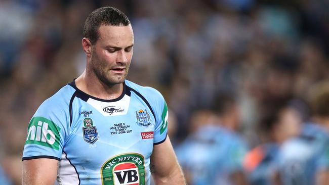 SYDNEY, AUSTRALIA — JUNE 21: Boyd Cordner of the Blues leaves the ground with an injury during game two of the State of Origin series between the New South Wales Blues and the Queensland Maroons at ANZ Stadium on June 21, 2017 in Sydney, Australia. (Photo by Ryan Pierse/Getty Images)