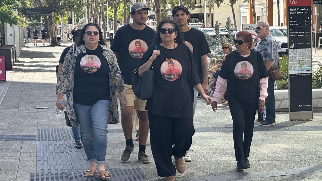 Cassius Turvey’s mother Mechelle Turvey arrives at the WA District Court building supported by friends and family. Picture: NewsWire/ Emma Kirk