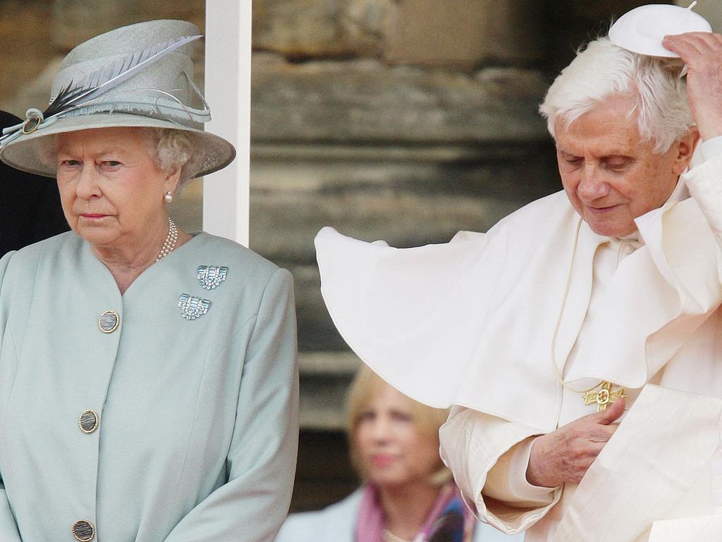 Pope Benedict XVI and Queen Elizabeth II, pictured in 2010, both died in 2022. Picture: Dave Thompson / POOL / AFP