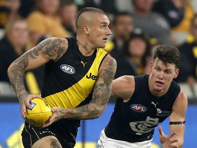 MELBOURNE, AUSTRALIA - MARCH 18: Dustin Martin of the Tigers in action during the 2021 AFL Round 01 match between the Richmond Tigers and the Carlton Blues at the Melbourne Cricket Ground on March 18, 2021 in Melbourne, Australia. (Photo by Dylan Burns/AFL Photos via Getty Images)