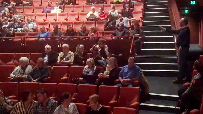 Barnaby Joyce (right) speaking to an audience member at the screening of High As Mike.