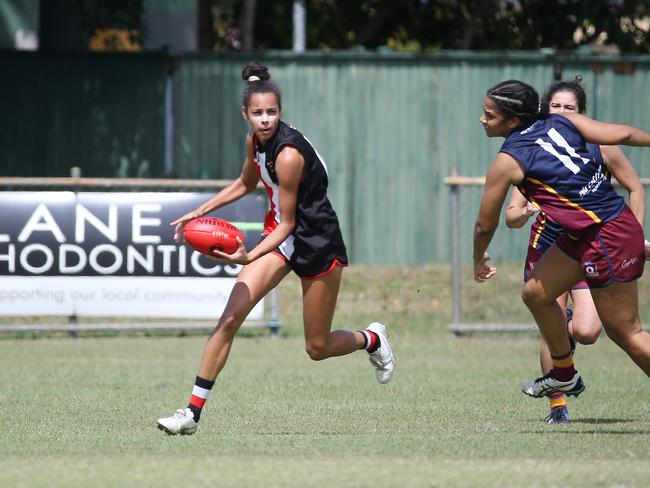 Saints' Tiarna Ahwang outpaced her opponents in the AFL Cairns Women's match between the Cairns Saints and the Cairns City Lions, held at Griffiths Park, Manunda. Picture: Brendan Radke
