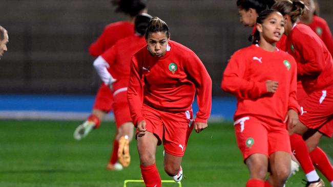 Chebbak (C) is already a footballing icon in Morocco. (Photo by William WEST / AFP)