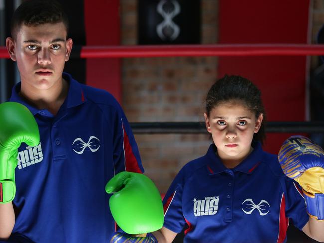 The Final Round gym at Prestons is home to a team of junior fighters who recently competed in a chamionship competition in Bangkok.Team members Cayllum McAlister [15] and Saffiyah El-Achrafi.[10]Pics Ian Svegovic