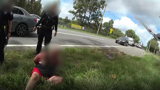 Police have charged a man for allegedly crashing into four cars and a pole, before arming himself with a machete and scissors at Beenleigh yesterday. Picture: Queensland Police