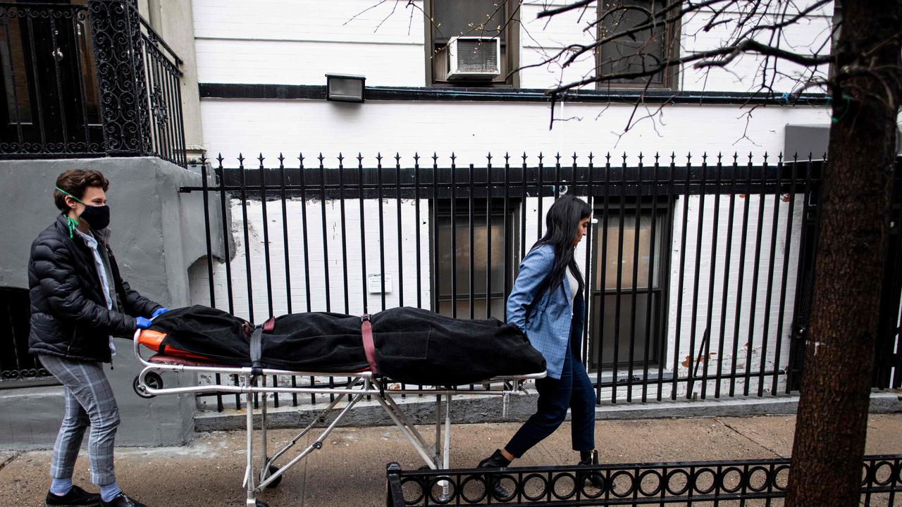 For many families already in distress, finding a funeral home in New York that will accept the body of a loved one is a headache; in Harlem, International Funeral home tries not to turn anyone away. Picture: Johannes Eisele / AFP.