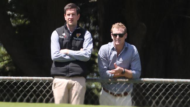 Cricket Tasmania general manager of high performance Simon Insley, left, and Cricket Australia chief selector George Bailey watch Tim Paine play in Hobart on Monday. Picture: Nikki Davis-Jones