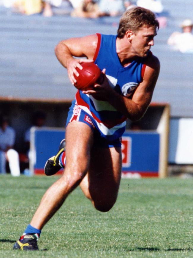 Simon Luhrs during a SANFL match for Central District in 1993.