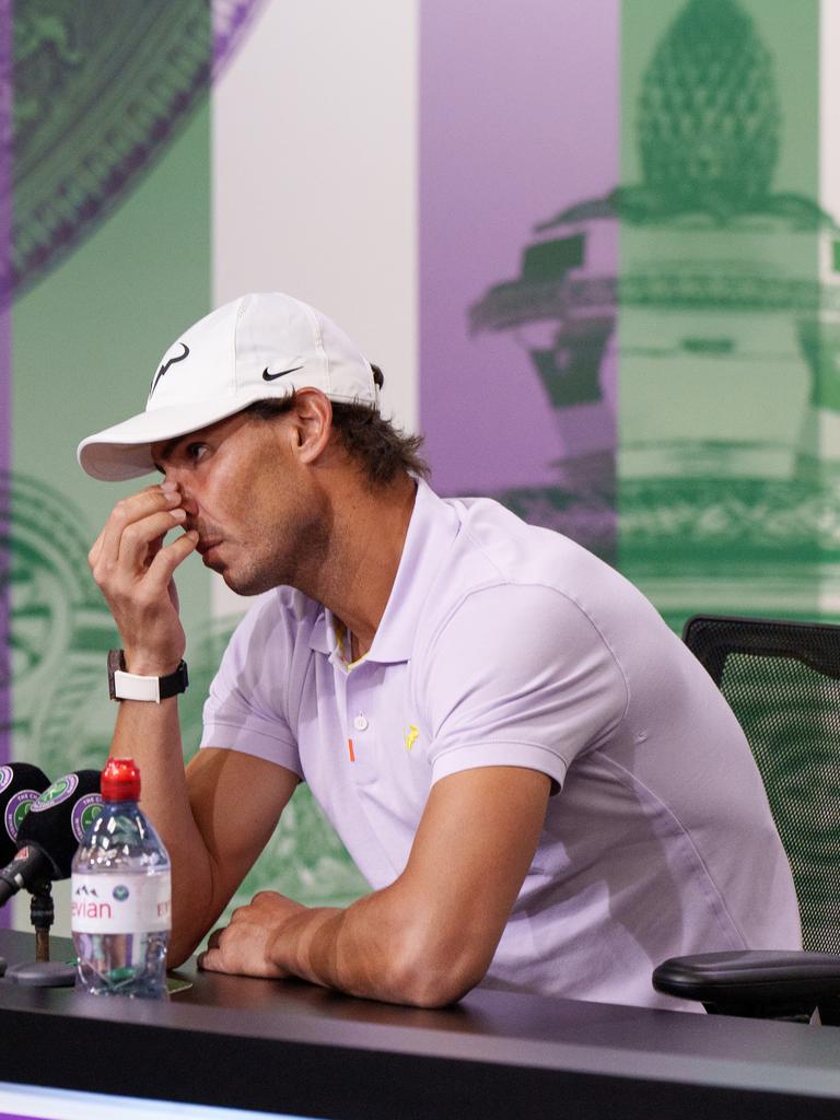 Rafa Nadal delivers the news no one wanted to hear. (Photo by AELTC/Joe Toth - Pool/Getty Images)