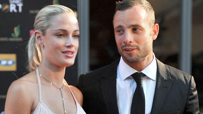 Oscar Pistorius and Reeva Steenkamp. Photo by LUCKY NXUMALO / AFP.