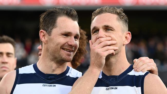 MELBOURNE, AUSTRALIA - SEPTEMBER 24: Patrick Dangerfield and Joel Selwood of the Cats celebrate winning the 2022 AFL Grand Final match between the Geelong Cats and the Sydney Swans at the Melbourne Cricket Ground on September 24, 2022 in Melbourne, Australia. (Photo by Quinn Rooney/Getty Images)