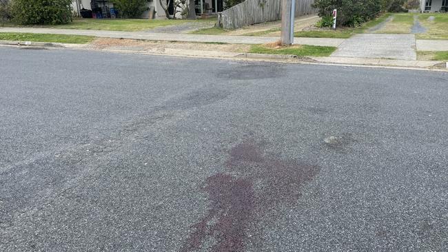 A large stain of blood on Pacific St where the injured boy lay. Picture: Chris Knight