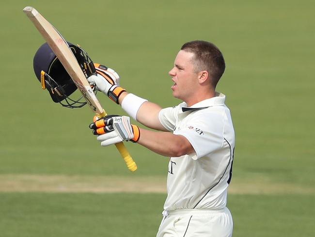 Victoria’s Marcus Harris celebrates bringing up his century. Picture: Getty Images 