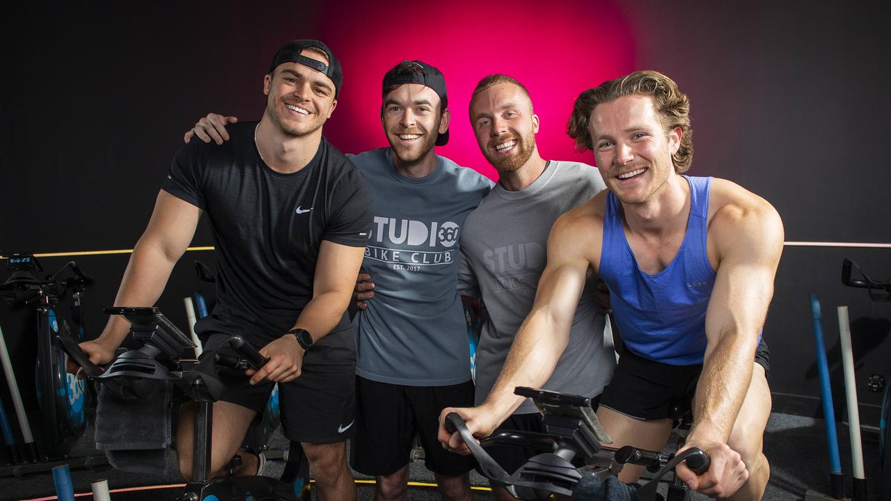 Sam Young, Sam Patterson, Alex Triplow and Aussie Edwards taking part in a spin class at Studio 360 Bike Club. Picture: Mark Brake
