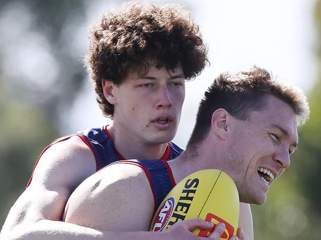 MELBOURNE, AUSTRALIA - September 4 ,2023. AFL .   Tom McDonald tackled by Kyah Farris-White during Melbourne training session at Casey Fields, Cranbourne in Melbourne, Australia.  Photo by Michael Klein.