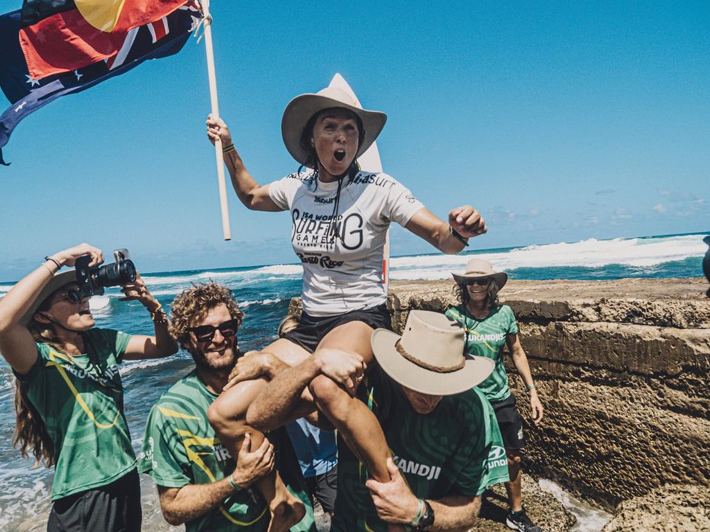 Sally Fitzgibbons celebrates winning gold at the ISA World Surfing Games. Picture: ISA / Jersson Barboza