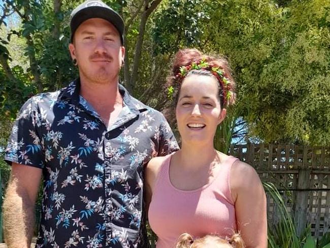 Luke Von Bertouch, Amy Nottle and their daughter, Savannah, are unable to build a house on their Wallaroo block because of a Telstra cable which runs through the property. They only discovered it when they came to dig the foundations for a new house. Picture: Amy Nottle