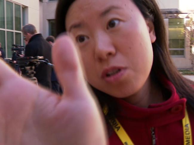 A journalist for Chinese state-owned media company Xinhua News tried to cover an SBS camera to stop herself being filmed during Prime Minister Scott Morrison's press conference at Parliament House in Canberra. Picture: Supplied