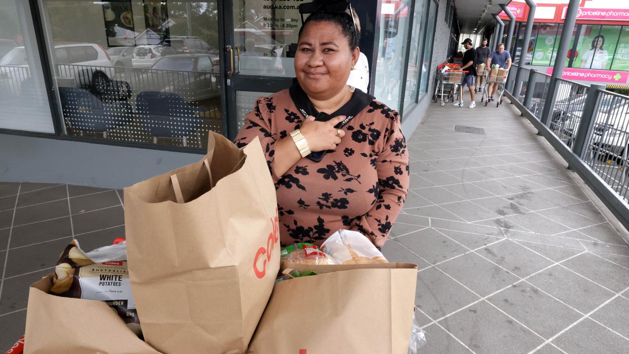 Jess Martin, shopping at Ashgrove Coles, were shopping to stock up because of the threat of cyclone Alfred. Photo: Steve Pohlner