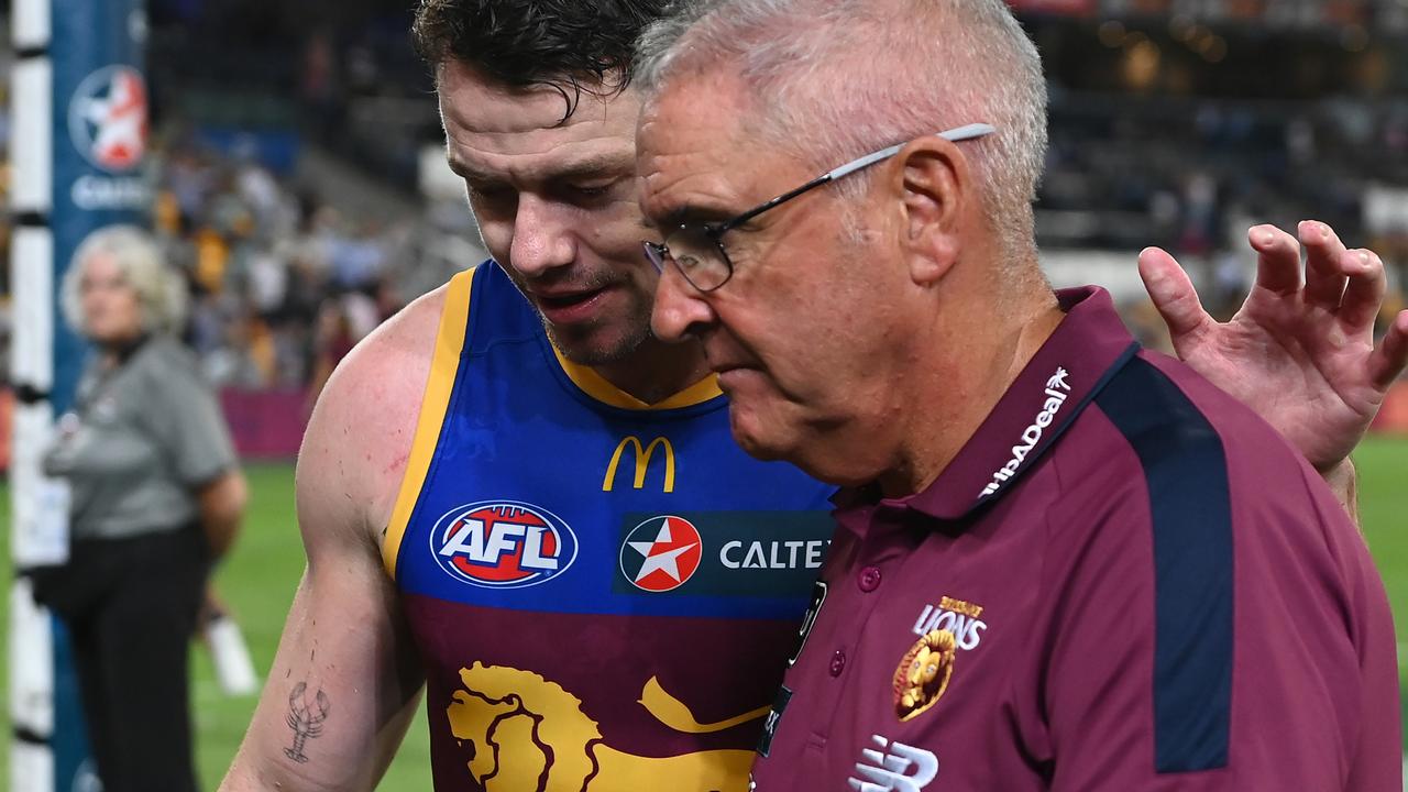 Lachie Neale and Chris Fagan after their defeat. Picture: Albert Perez/AFL Photos via Getty Images