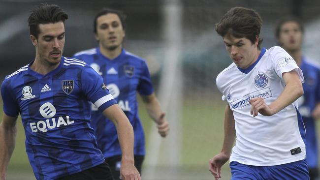 Adelaide Blue Eagles star Hamish McCabe (R) under pressure from Adelaide Comets’ Allan Welsh during a NPL SA match in 2019. Picture: Dean Martin