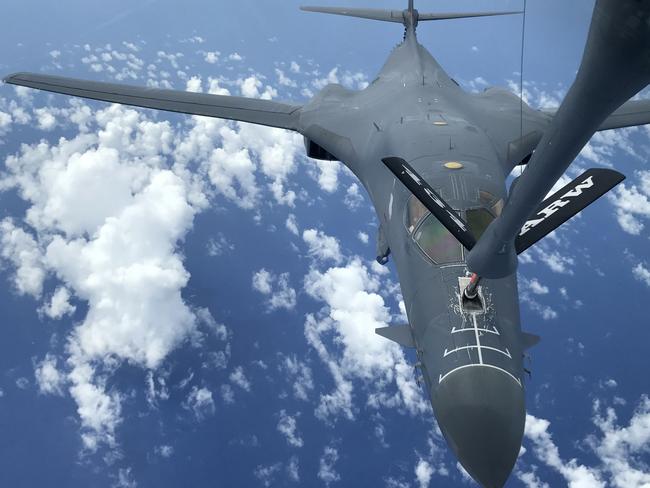 A US Air Force B-1B Lancer assigned to the 37th Expeditionary BombSquadron refuels during a 10-hour mission from Andersen Air Force Base, on Guam, to the Korean Peninsula. Picture: AFP US AIR FORCE