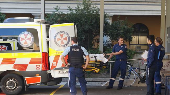 Police and paramedics bring a new arrival to St Vincent’s Emergency Department. Picture: Mark Isaacs