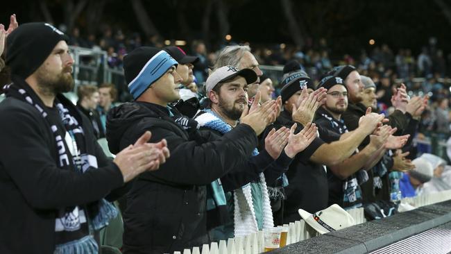 Port Adelaide fans give Todd Marshall a standing ovation to acknowledge his return to AFL. Picture: Sarah Reed